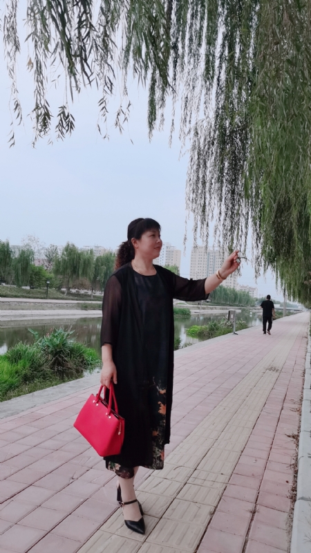 周本玲的第一张照片--日照相亲服务中心